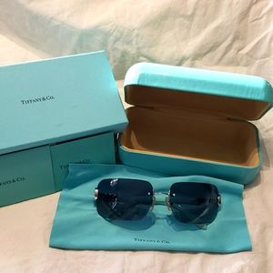 Tiffany and Co. frameless style sunglasses with gradient shade lenses